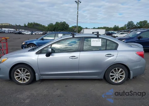 2013 Subaru Impreza 2.0I Premium z USA, uszkodzony, nr VIN JF1GJAB63DH007038